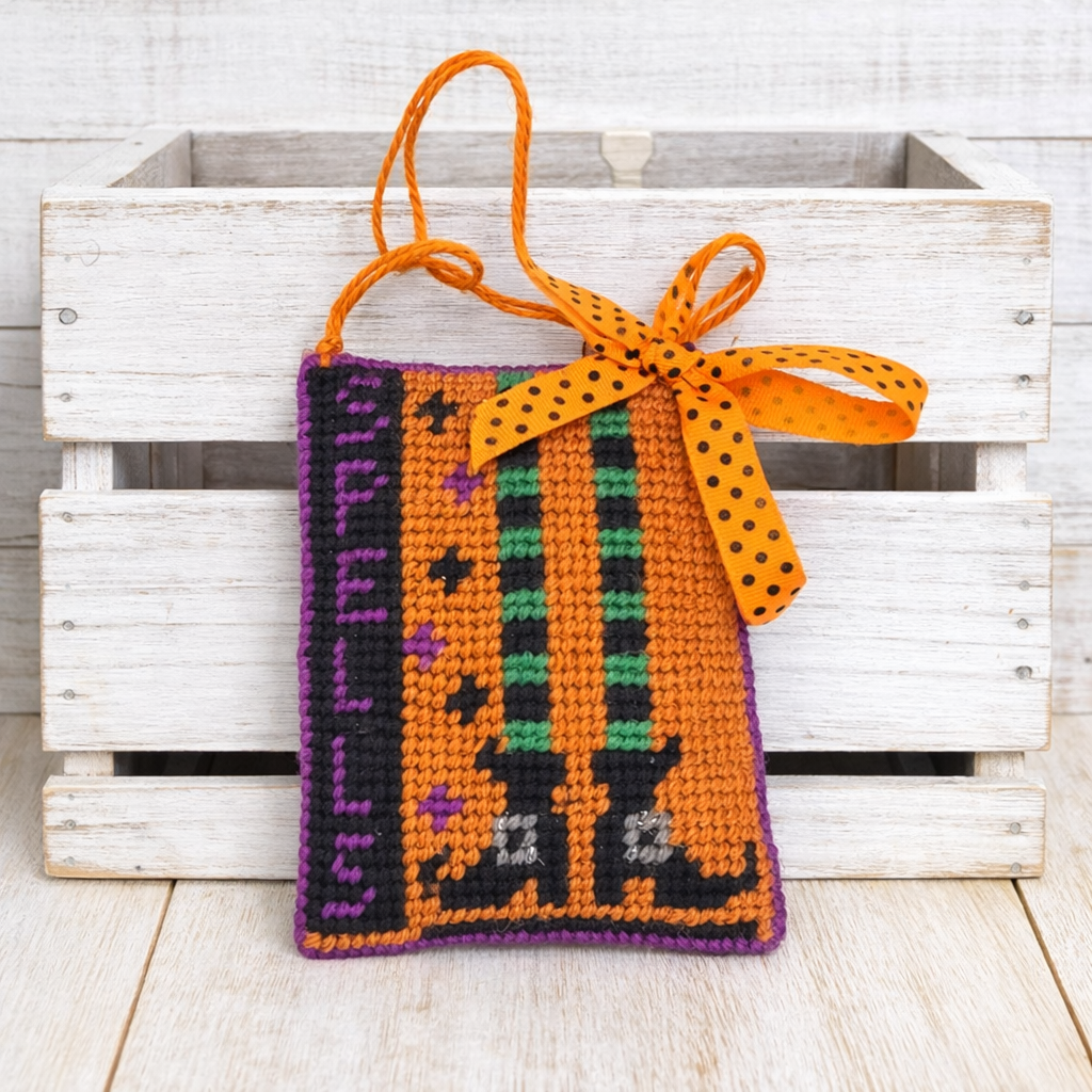 Halloween finished needlepoint SPELLS witch legs ornament