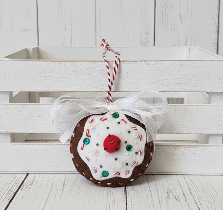 Gingerbread felt and white icing cookie ornament with cherry