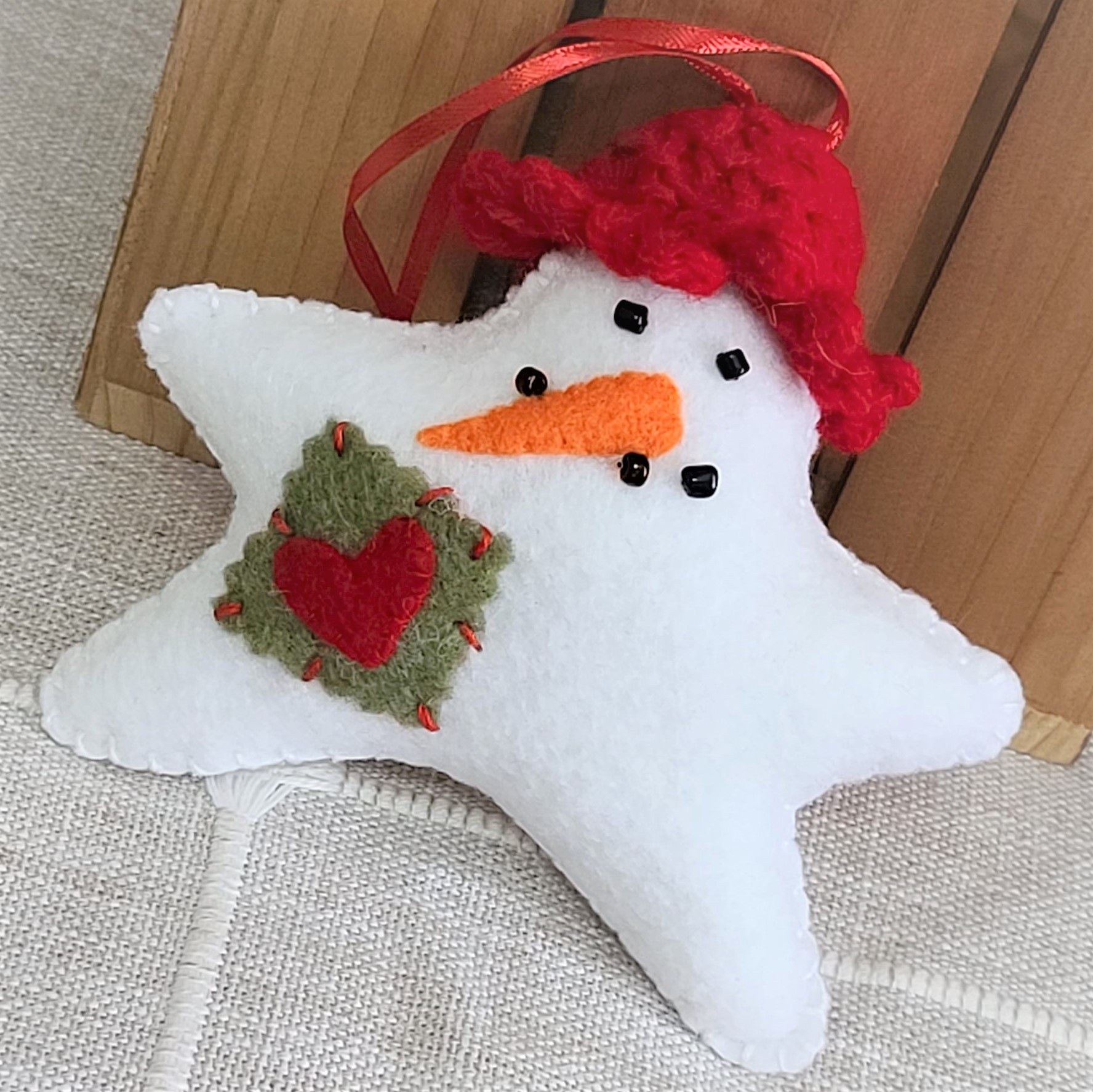 Felt Snowman star ornament with crochet hat - red hat