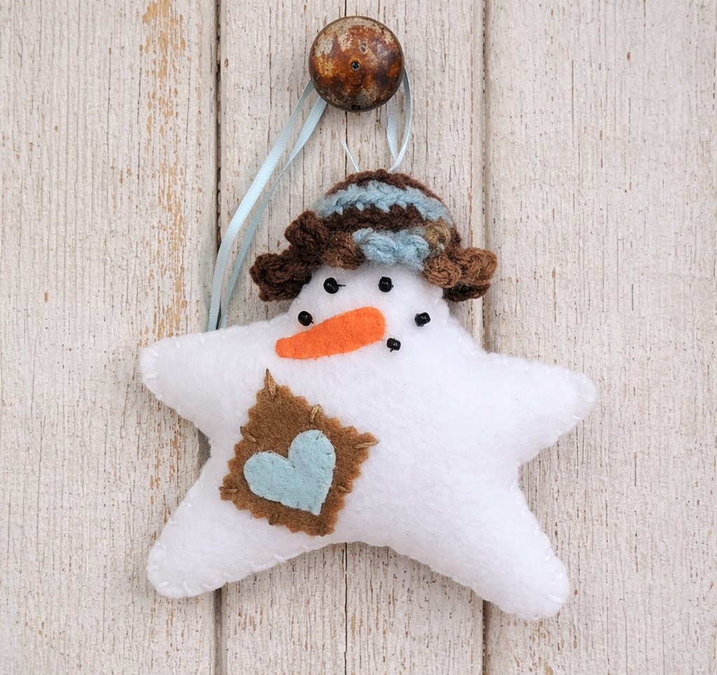 Felt Snowman star ornament with crochet hat - brown/blue hat