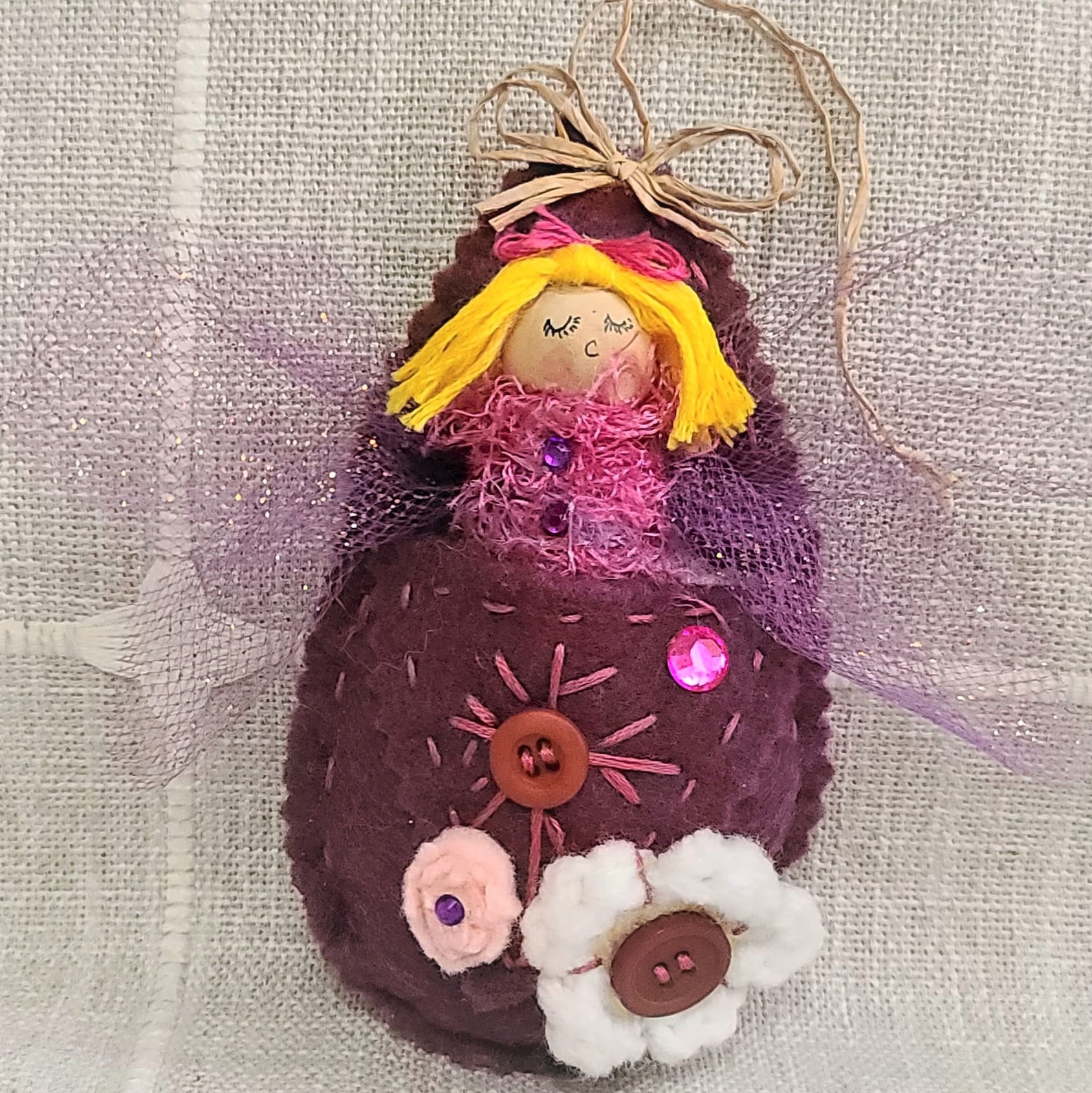 Pod babies whimsical ornament -blonde girl in mauve purple pod