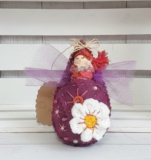 Pod babies whimsical ornament -red head girl in magenta pod