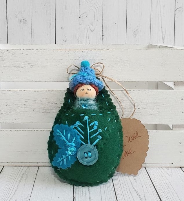 Pod babies whimsical ornament -red hair with blue hat Pod babies whimsical ornament -red hair with blue hat