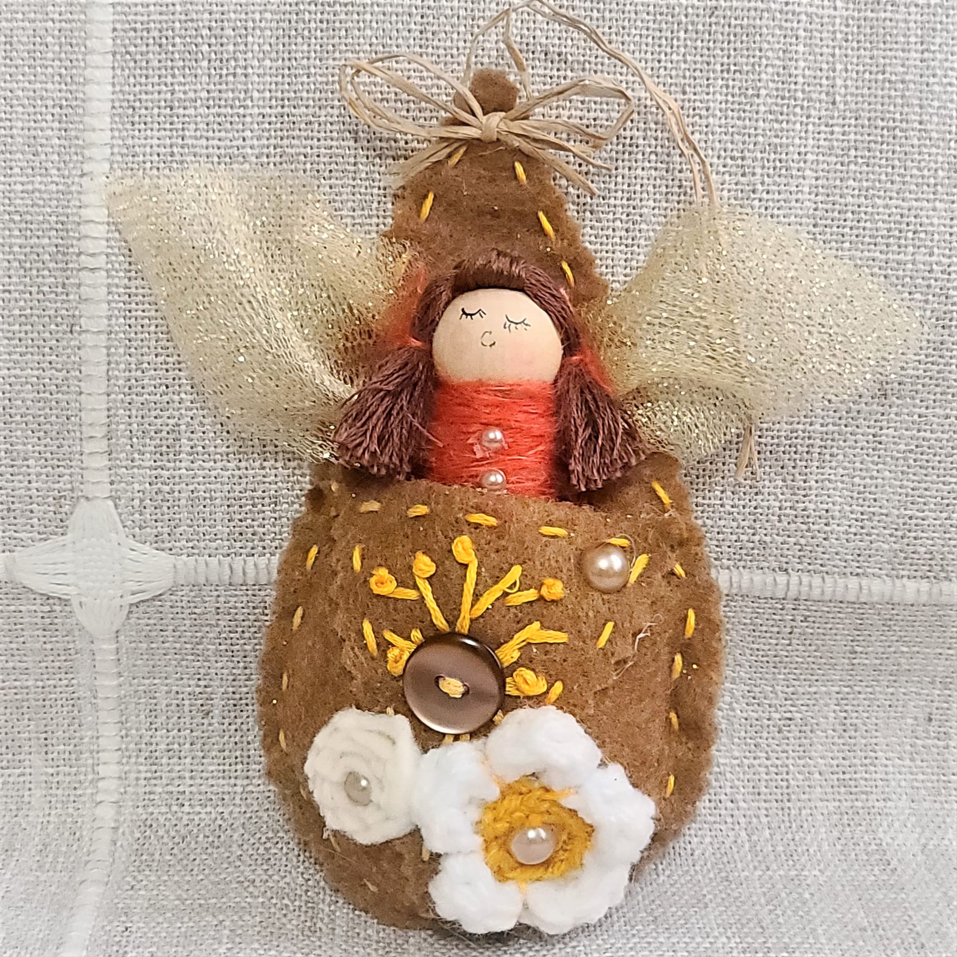 Pod babies whimsical ornament - red head girl in brown pod