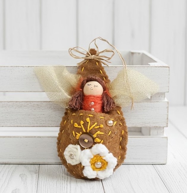 Pod babies whimsical ornament - red head girl in brown pod