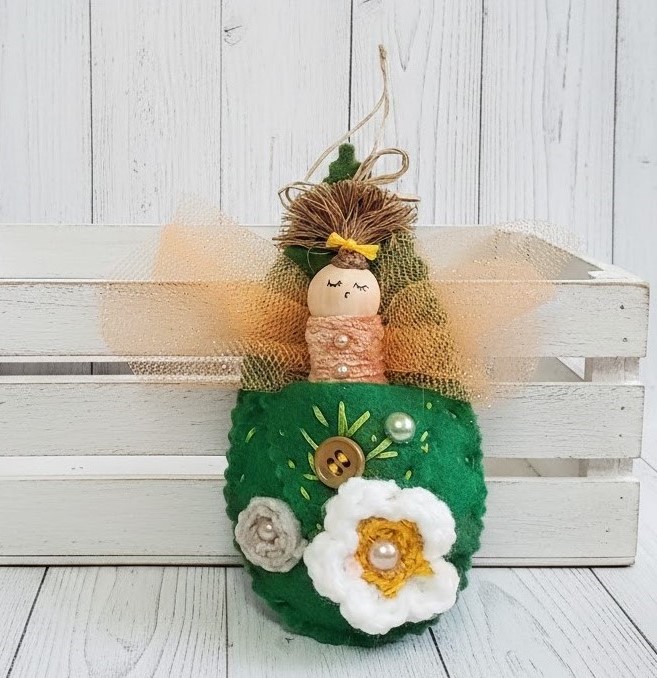 Pod babies whimsical ornament - auburn hair ponytail in pod