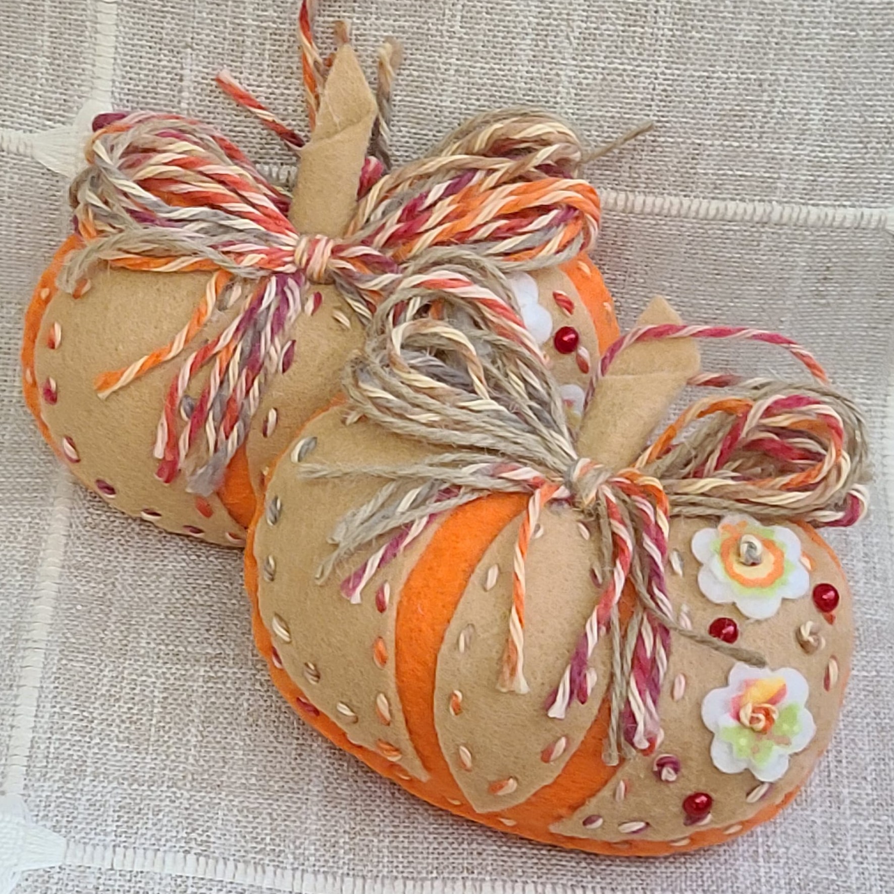 Felt pumpkin ornament - orange & tan w/flowers