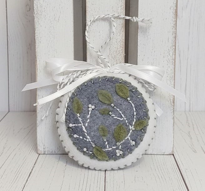 Felt embroidery and beaded winter scene ornament