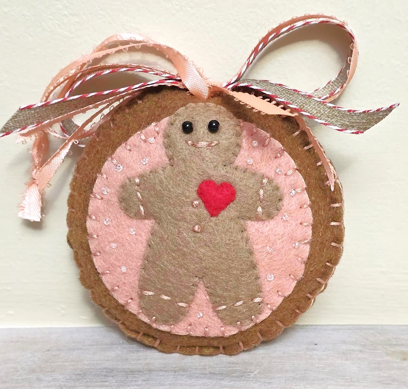 Felt ornament, handmade, gingerbread man with glass bead accents