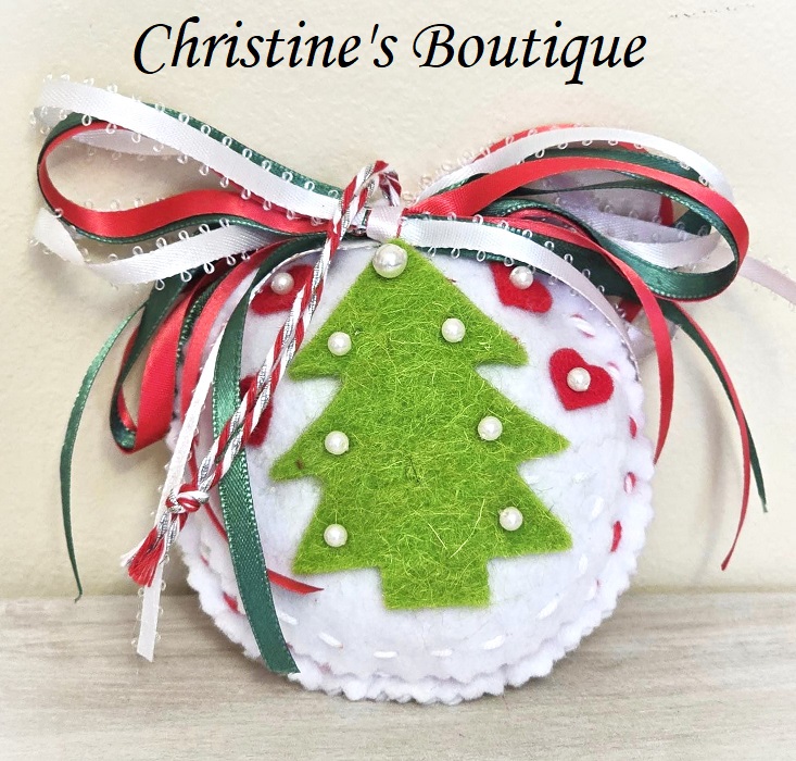 Round felt ornaments with evergreen trees pearl detail ornament