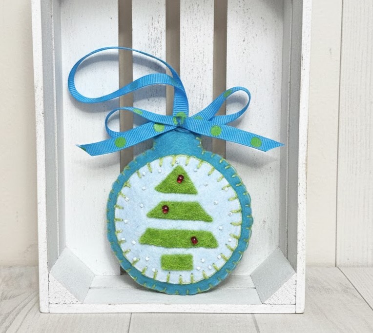 Christmas felt bulb shaped ornament with modern evergreen