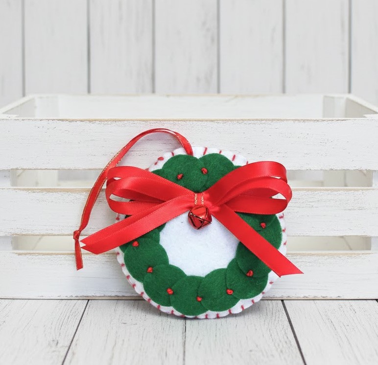 Felt ornament with dimensional wreath detail