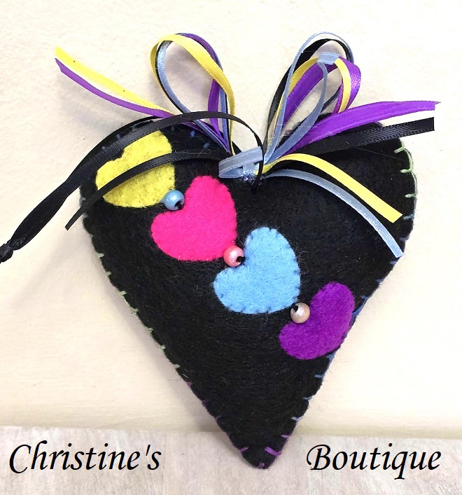 Handmade felt ornament, felt black heart with pink, blue, yellow and purple hearts, Mardi Gras ornament