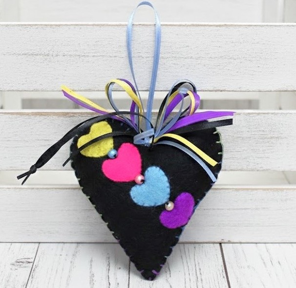 Black heart ornament with multi color heart applique