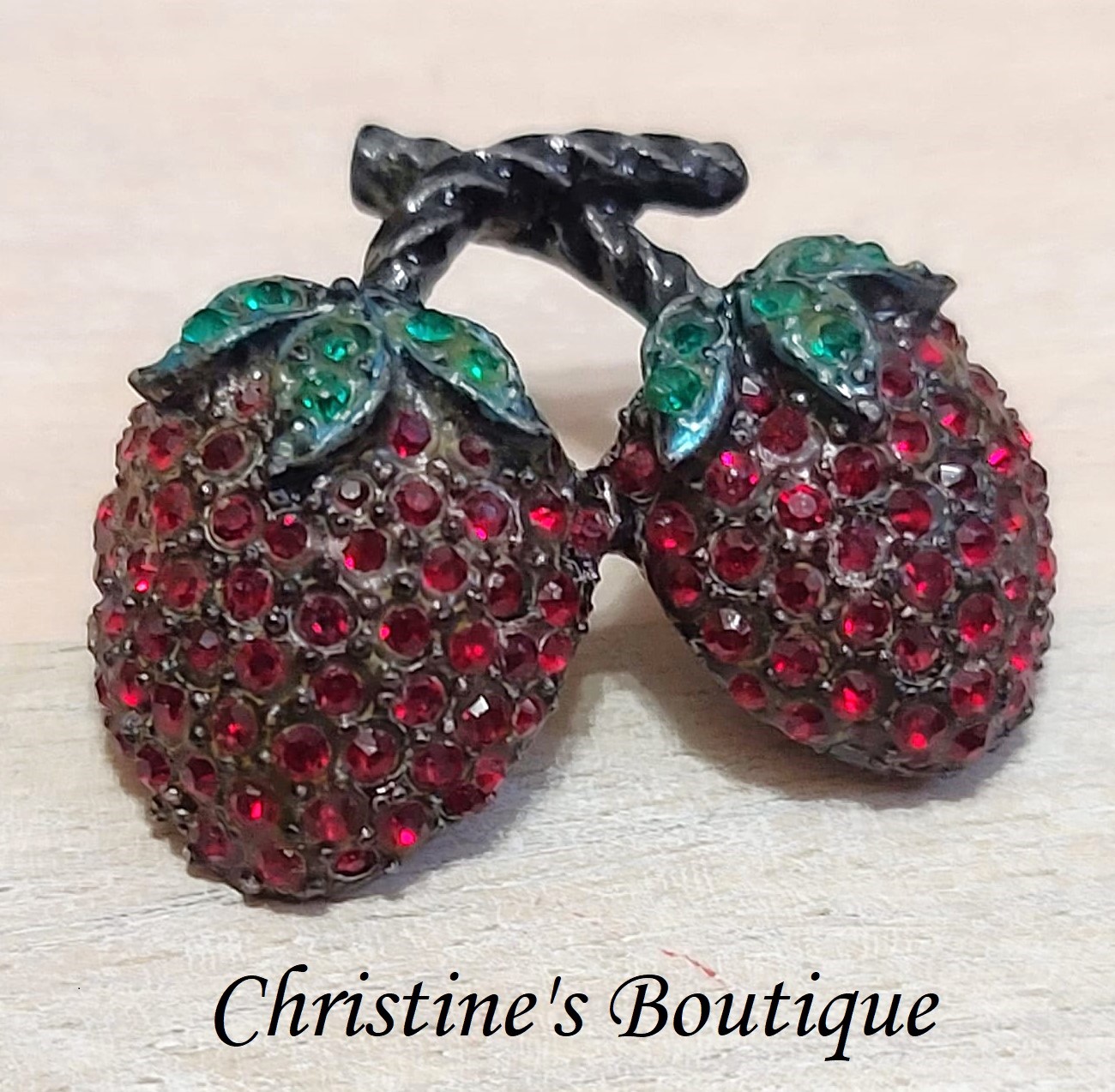 Vintage strawberry brooch, pin, dark red rhinestones, set in a black metal - Click Image to Close