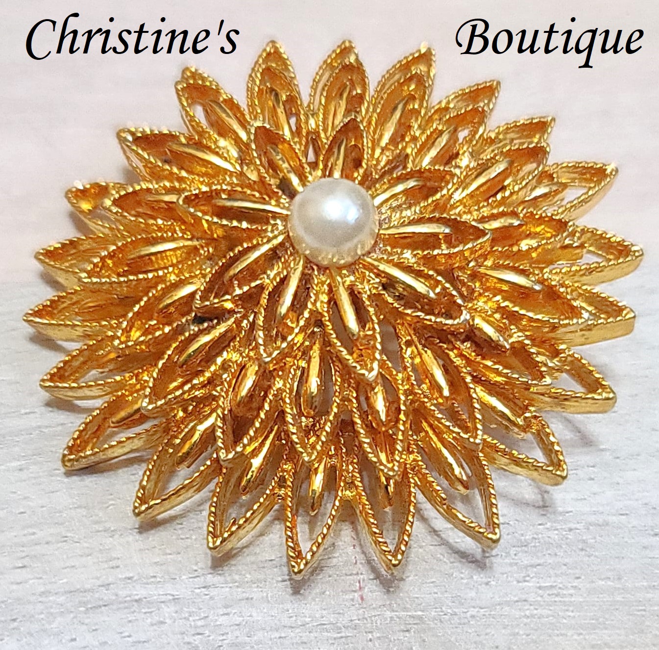Vintage sunburst pin, brooch, goldtone with pearl center - Click Image to Close