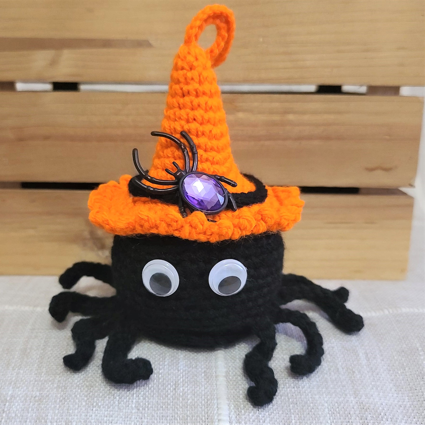 Crochet amigurumi halloween black spider orange witch hat